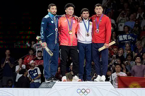 Paris Olympics men's Greco-Roman 77kg wrestling: Kazakhstan's Demeu Zhadrayev, silver, Japan's Nao Kusaka, gold, Armenia's Malkhas Amoyan, Kyrgyzstan's Akzhol Makhmudov, bronze